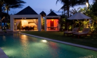 Reclining Sun Loungers at Night - Majapahit Beach Villas - Sanur, Bali