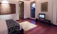 Bedroom with Wooden Floor and TV - Sanur Residence - Sanur, Bali