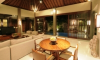 Living Area with Pool View at Night - Akara Villas 1 - Seminyak, Bali