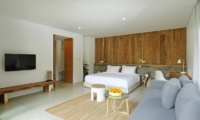 Bedroom with Sofa and TV - Aria Villas - Ubud, Bali