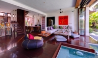 Living and Dining Area with Wooden Floor - Majapahit Beach Villas - Sanur, Bali