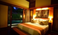 Pool Side Bedroom at Night - Nyuh Bali Villas - Seminyak, Bali