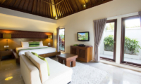 Bedroom with Sofa and TV - Serene Villas Lotus - Seminyak, Bali