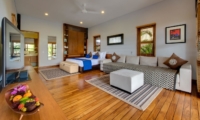 Bedroom with Sofa and Wooden Floor - Villa Kinaree Estate - Seminyak, Bali