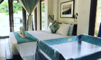 Bedroom with Baby Cot - Villa Samudera - Nusa Lembongan, Bali