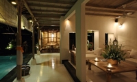 Indoor Living Area with Pool View at Night - Villa Shamballa - Ubud, Bali