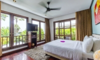 Bedroom with TV - Mary's Beach Villa - Canggu, Bali