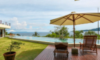 Pool Side Loungers - Villa Gumamela - Candidasa, Bali.jpg