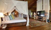 Bedroom with TV - Villa Nag Shampa - Ubud Payangan, Bali