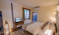 Bedroom with TV - Scallywags Joglo - Gili Air, Lombok